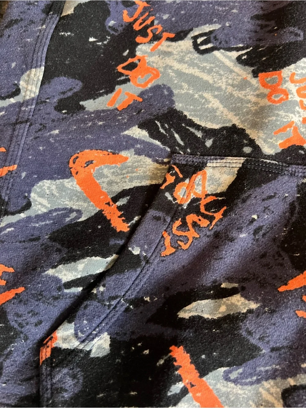 Nike Kids Navy Camo Hoodie with Bright Orange Logo